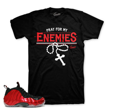 Metallic red foamposite tee match shoes.