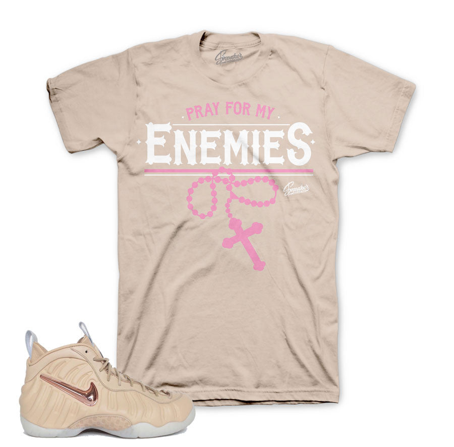 Tees match Foamposite vachetta tan sneakers shirts.