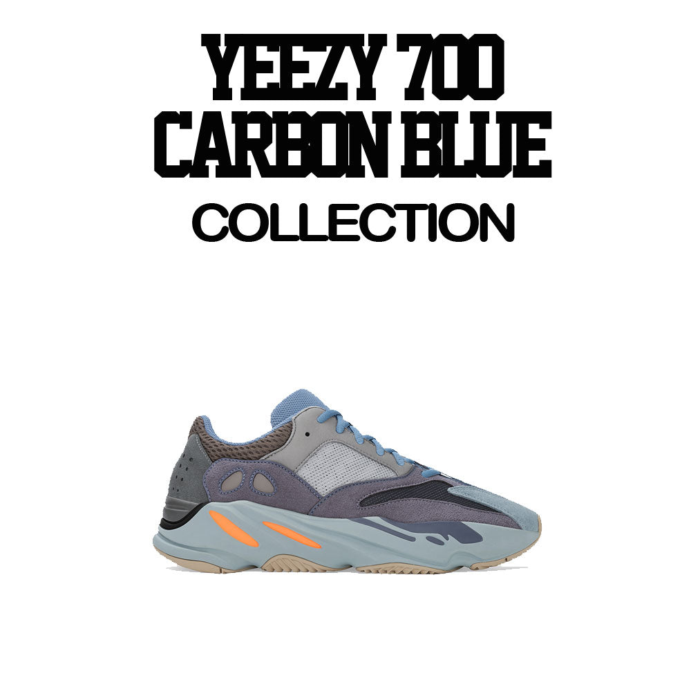 white t shirt collection matches the yeezy 700 carbon blue sneakers 