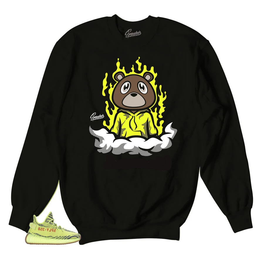 Sweaters match yeezy boost frozen yellow sneakers.