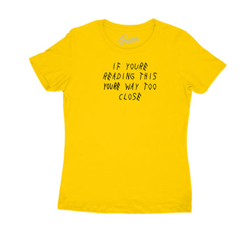 University Gold Jordan 12 sneakers have matching womens shirts