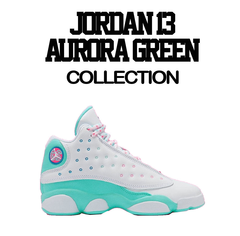 Tees match perfect with the aurora green Jordan 13 sneakers